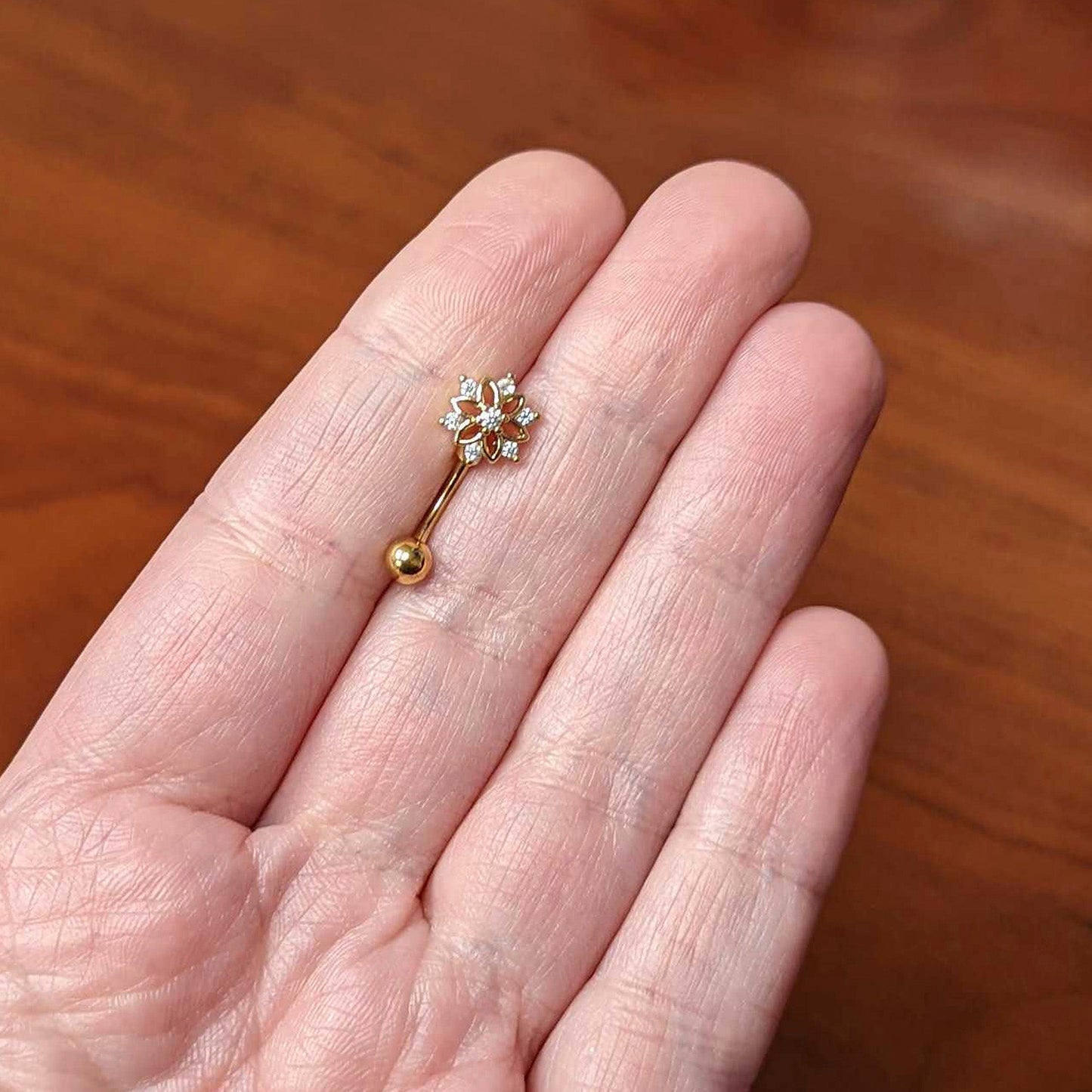 16G 5/16 Clear Gem Gold Tone Flower Snowflake Curved Eyebrow Ring