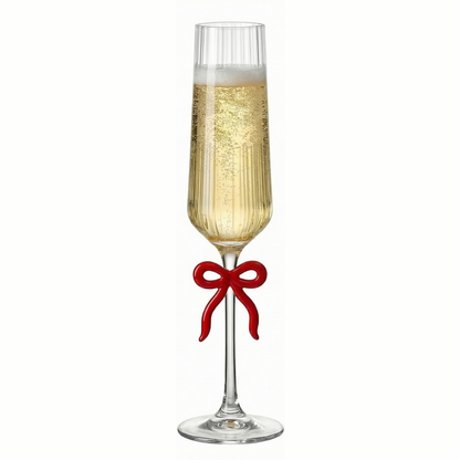 Single Ribbed Clear Champagne Glass with Red Bow on Stem