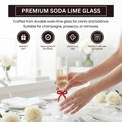 Single Ribbed Clear Champagne Glass with Red Bow on Stem