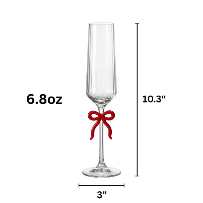 Single Ribbed Clear Champagne Glass with Red Bow on Stem