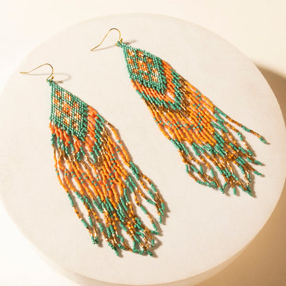 Myra Sundance Ember Beaded Fringe Earrings in Gilded Coral