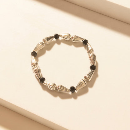 Myra Iron Moon Stack Bracelet in Blue Forge