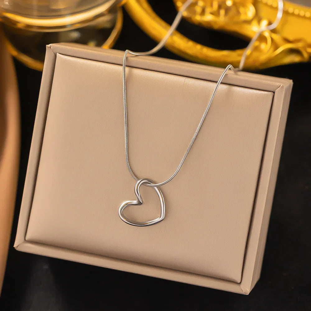 ANENJERY Stainless Steel Twist Hollow Heart Pendant Necklace | Trendy Clavicle Chain for Women