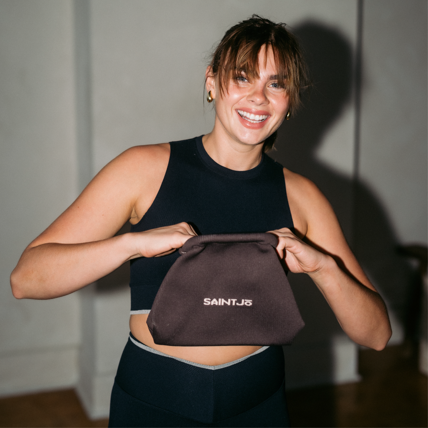 SIGNATURE CLUTCH